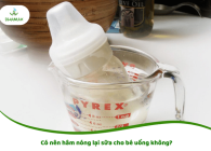 Có nên hâm nóng lại sữa cho bé uống không?